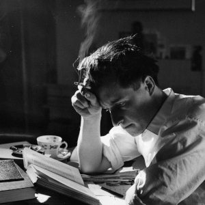 A Student Reading at His Desk - Thurston Hopkins